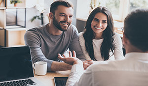 couple meeting with a financial advisor