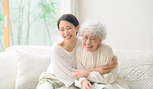 mother and daughter laughing