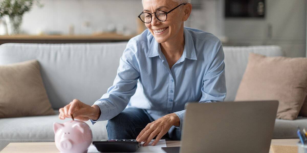 woman counting tax withholdings